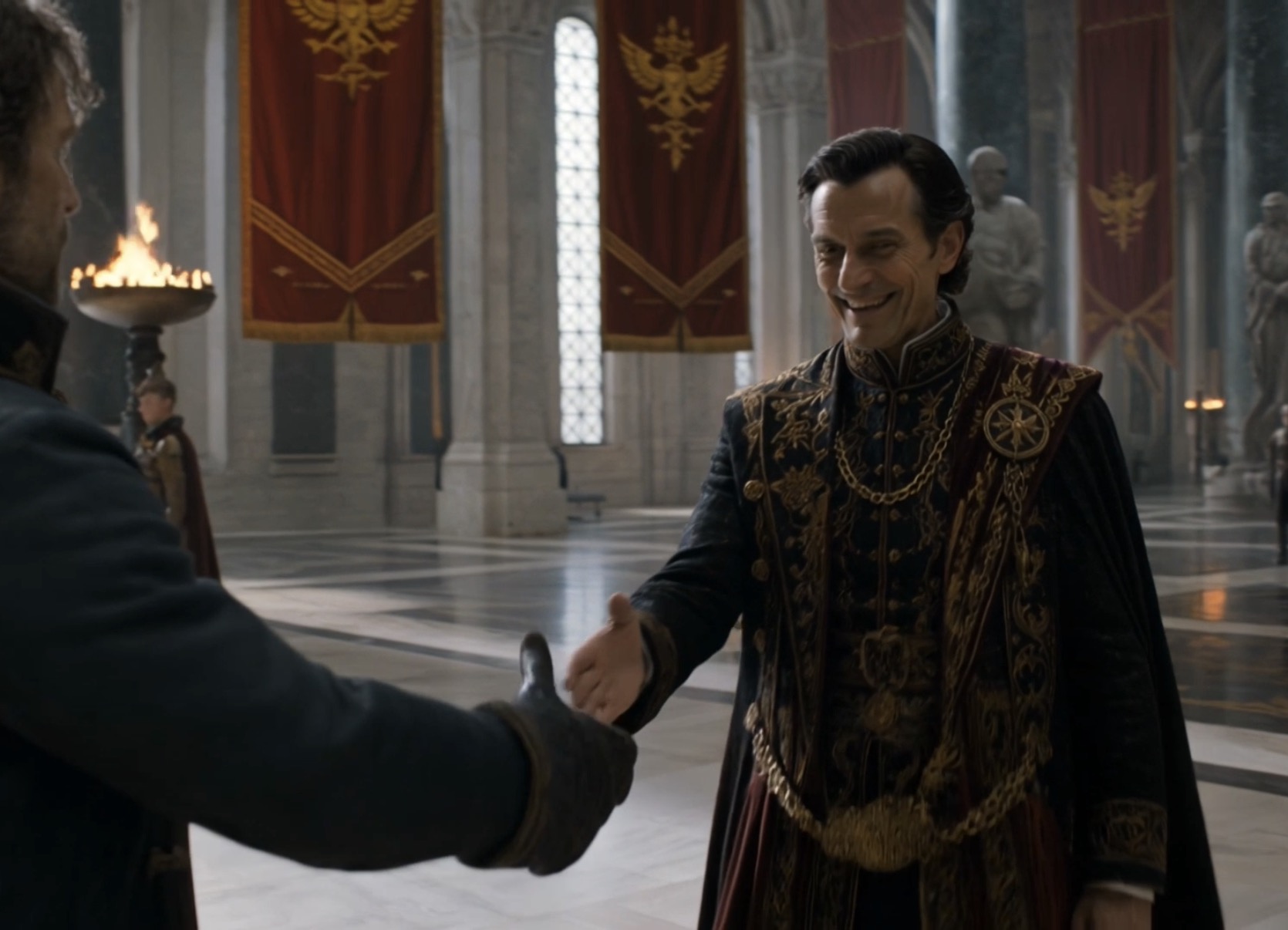 Joseph Flakberg smiling while shaking an official's hand in Crownfall